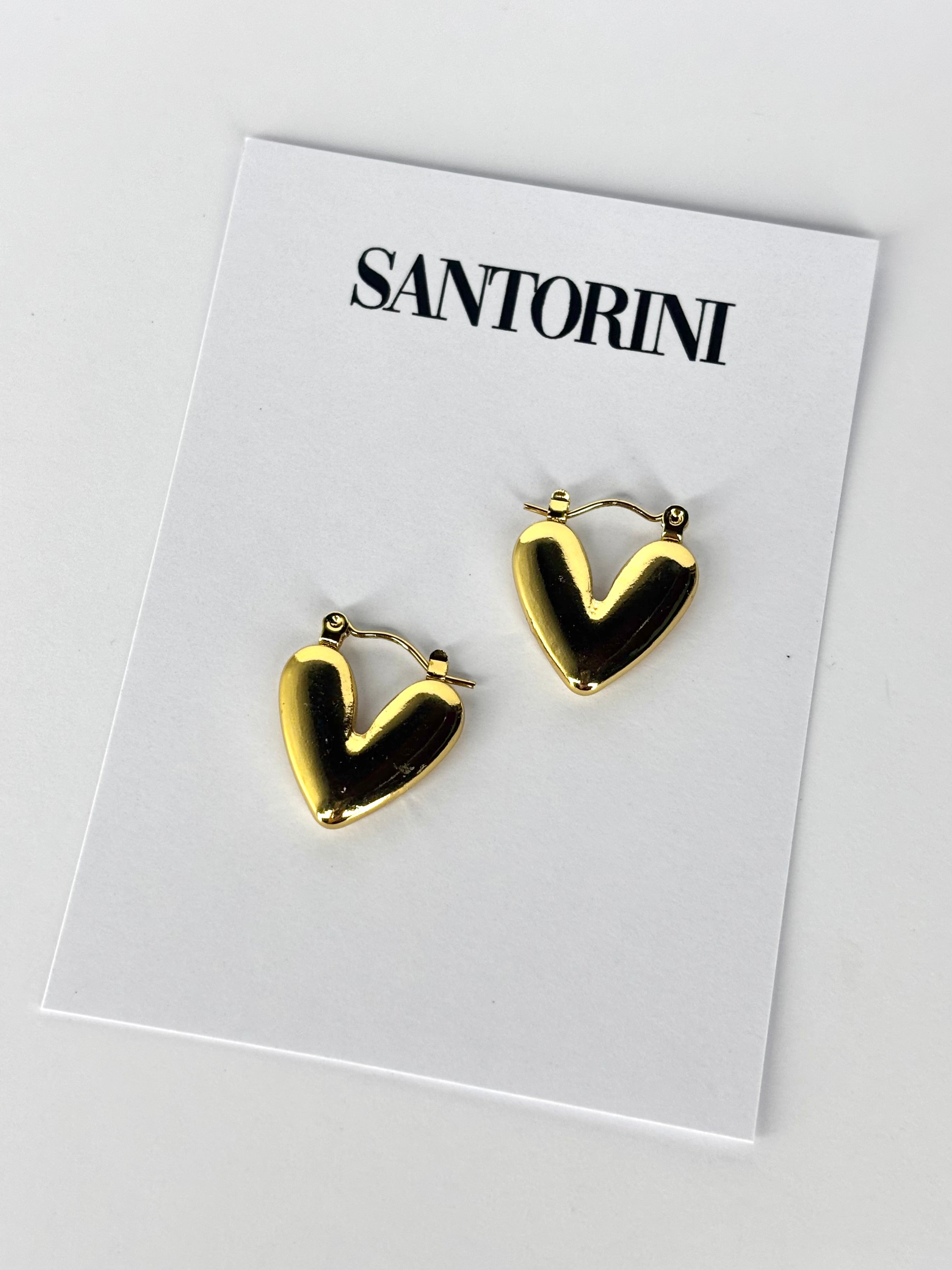 Aritos corazoón dorados